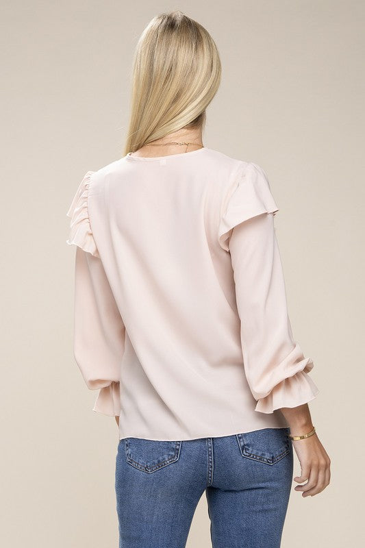 Blusa de manga larga con ribete de encaje y cuello en V